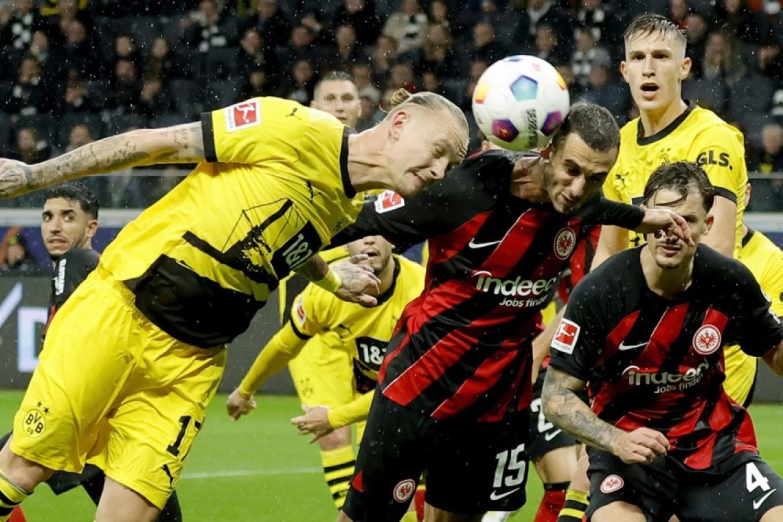 Dortmund le s točko iz Frankfurta
