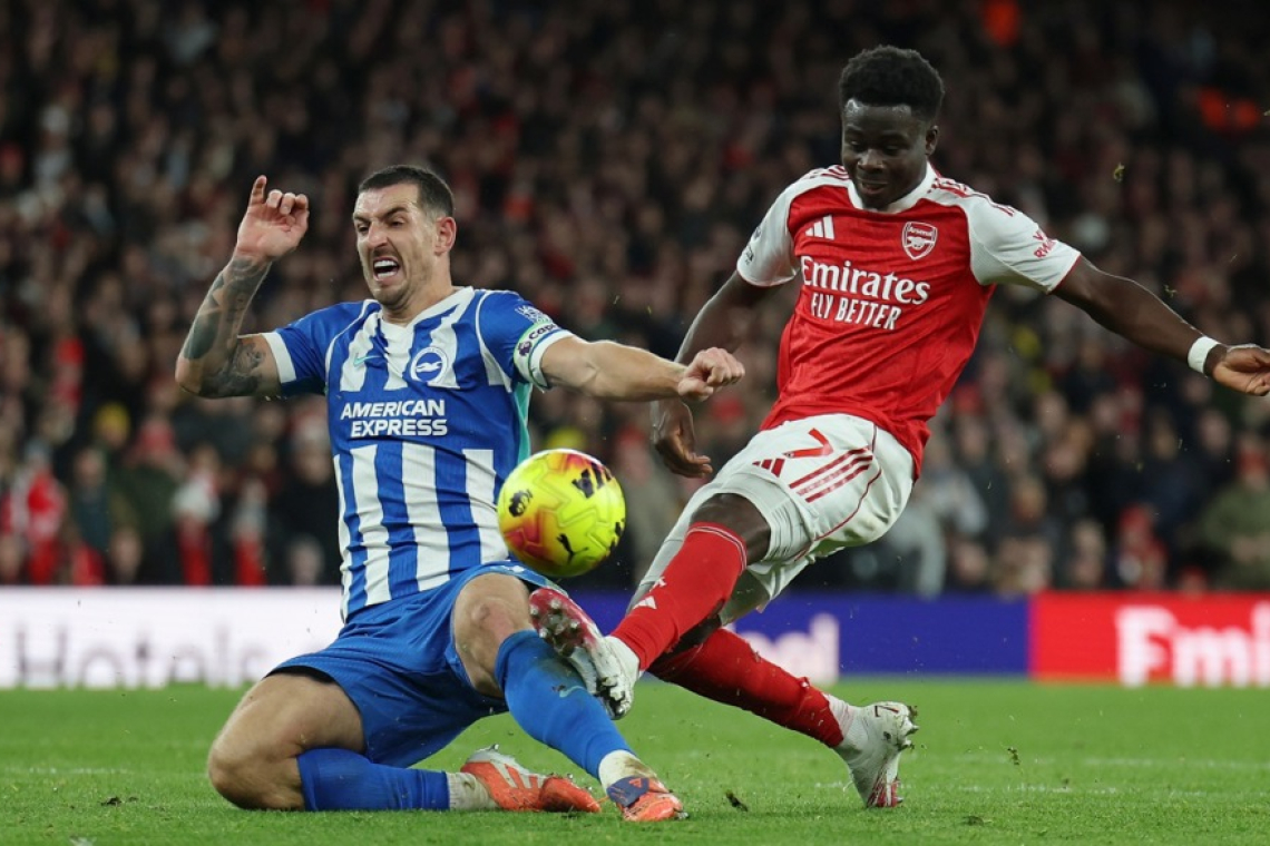 Arsenal in Manchester City nadaljujeta boj za vrh 